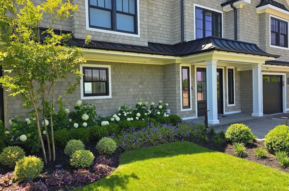 Beautiful landscape of a house front side